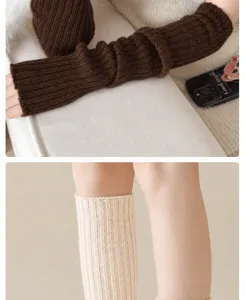 Knit leg warmers detail shot showing ribbed texture and cozy wool blend winter fashion style.