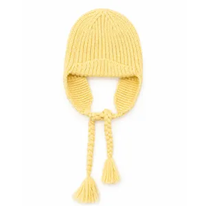 Yellow knitted earflap beanie winter hat with braided tassels warm windproof woman