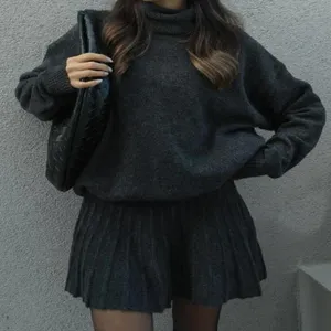 Women autumn turtleneck knit sweater and pleated skirt set casual solid color outfit.