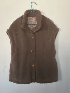 Women solid color stand collar warm fleece vest detail view, casual sleeveless outerwear.