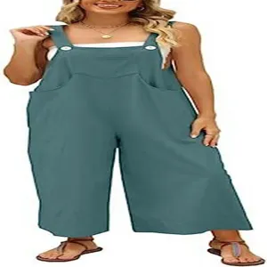 Vista di dettaglio della comoda tuta pantalone ampia in cotone e lino da donna con tasche.
