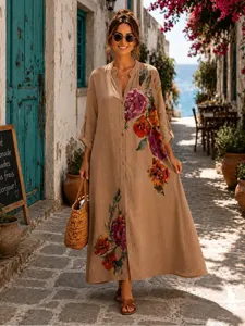 Abito lungo boho con stampa floreale, colletto a camicia, bottoni frontali e maniche lunghe.