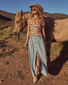 Bohemian style womens long denim skirt with front slit and chic horse print cropped top details.