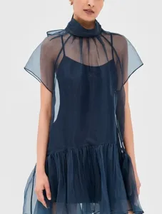 Dark blue sheer organza layered mini dress detail, elegant high neck fashion design.