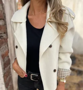 Stylish women's double-breasted woolen coat with lapel and chic plaid cuff details for winter.