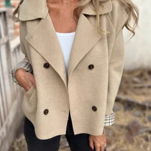 Stylish women's double-breasted wool blend coat with chic plaid cuffs for winter season warmth.