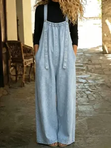 Peto vaquero azul claro para mujer, mono casual de mezclilla holgado con estilo retro.