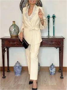Beige pantsuit with sequin lapel, long sleeve blazer and trousers for women detail view.