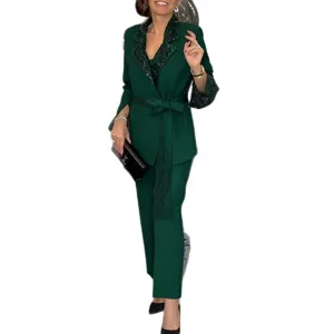 Elegant emerald green sequin blazer and trousers two-piece women suit set for party.