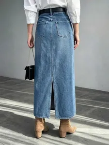 Detail view of high waist denim long skirt with back slit design, casual blue denim style.