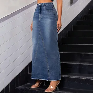 Elegant high-waisted denim maxi skirt featuring a chic raw hem and stylish fishtail cut.