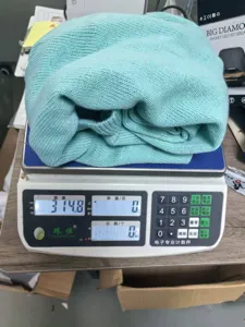 Detailed product view showing the actual weight and soft knit texture of this cardigan.