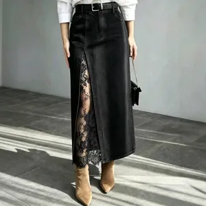 High-waisted black washed denim midi skirt with lace contrast slit, perfect for casual wear.