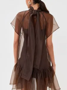 Summer brown sheer halter mini dress with elegant back bow tie and chic ruffled hem detail.