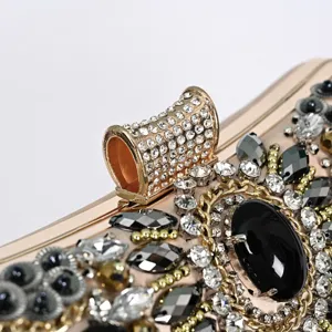 Luxury rhinestone evening clutch bag sparkling crystal beaded detail close up view aesthetic