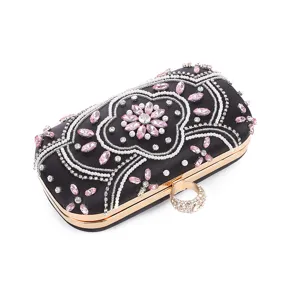 Elegant black satin evening clutch bag with sparkling pink rhinestones, pearls and ring clasp.