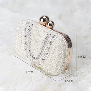 Elegant white pearl evening clutch bag for women, luxury wedding bridal handbag and purse.