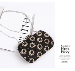 Elegant black rhinestone evening clutch bag with chain strap for formal party dress banquet.
