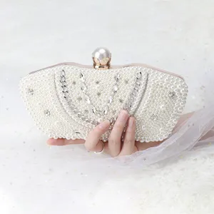 Elegant white pearl clutch bag for women, sparkling rhinestones and metal chain for evening parties.