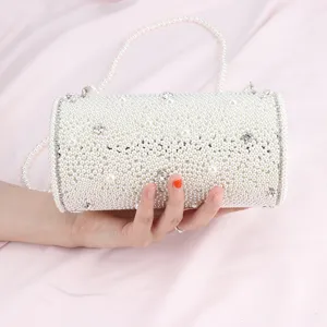 Borsa a secchiello cilindrica di perle, elegante borsa a tracolla fatta a mano per donne.
