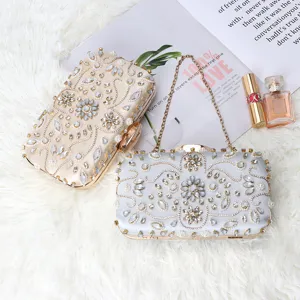 Stunning satin evening clutch bag with handmade beadwork and rhinestones, elegant party bag.