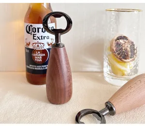 Nordic retro black walnut beer bottle opener with wooden handle for home kitchen use.