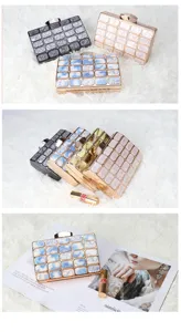 Acrylic evening clutch bag detail view, showing marble pattern and metallic frame for party wear.