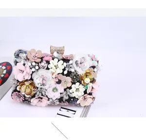 Stunning 3D floral sequin evening clutch bag with sparkling rhinestones for parties.