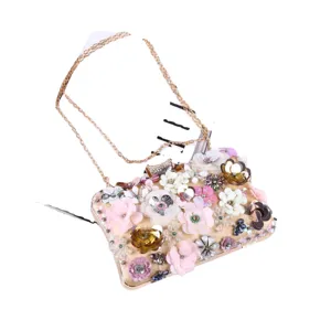 Exquisite floral beaded evening clutch bag with chain strap, perfect for parties and weddings.
