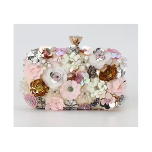 Elegant floral beaded evening clutch bag for women, sparkling sequin wedding banquet handbag.