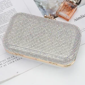 Elegant rhinestone evening clutch bag with shimmering crystals and gold-tone metal frame.