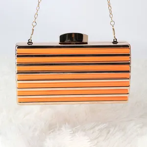 Acrylic evening clutch bag for women, orange stripe metal chain shoulder crossbody bag main view.
