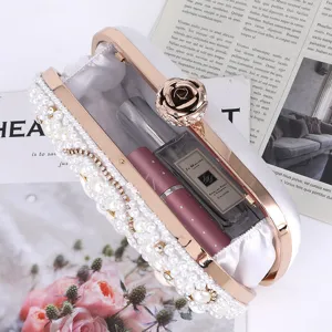 Elegant pearl rhinestone evening clutch bag with rose clasp luxury wedding bridal handbag.