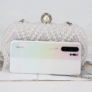 Elegant handmade pearl beaded evening clutch bag for women, luxury socialite shoulder bag.