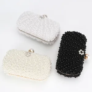 Élégant sac de soirée perlé pour femmes, mini pochette de fête en perles avec fermoir strass.