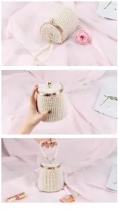 Detailed view of the elegant pearl bucket bag with gold clasp and pearl handle, luxury style.