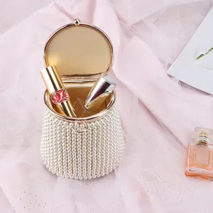 Elegant pearl bucket handbag for women, exquisite beaded evening clutch purse with metal clasp.