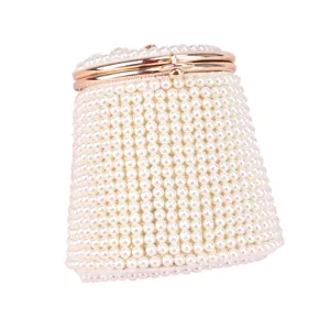 Elegant pearl bucket bag for women, chic beaded evening handbag with metal clasp closure.