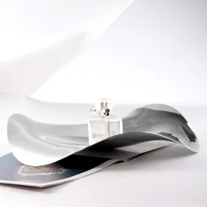 Modern stainless steel mirror wavy decorative fruit plate, creative irregular tray for home decor.