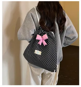 Sac à dos cordon pois doux avec joli nœud rose, sac décontracté tendance pour femmes.