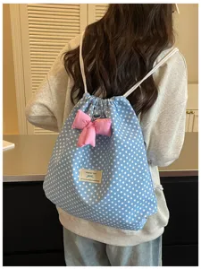 Sac à dos cordon bleu à pois doux avec joli nœud rose pour femmes loisirs voyage quotidien.