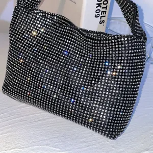 Sparkling black rhinestone underarm handbag for women, elegant crystal hobo shoulder bag.