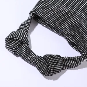 Sparkly rhinestone underarm bag with knotted handle, elegant crystal evening handbag for women.