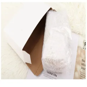 Pearl evening bag with chain strap and elegant beaded design for formal party events.