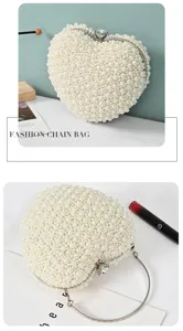 Heart-shaped pearl beaded evening bag detail, elegant bridal wedding clutch purse for women.