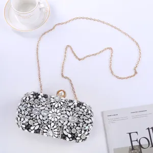 Luxury rhinestone evening clutch bag with pearl clasp and gold chain for women wedding.