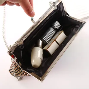 Luxury rhinestone evening clutch bag with metal chain and sparkling crystal clasp for women events.