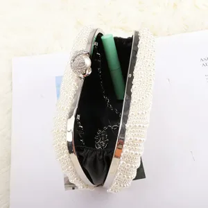 Elegant pearl evening clutch bag with chain strap, luxury bridal handbag for women party.