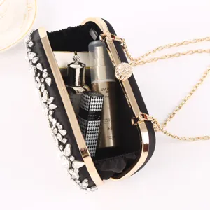 Elegant black rhinestone evening clutch bag with gold chain strap for women wedding parties.