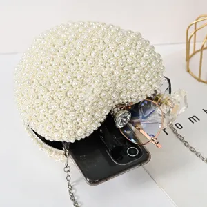 Heart-shaped pearl beaded evening bag stylish clutch purse for women party wedding banquets.